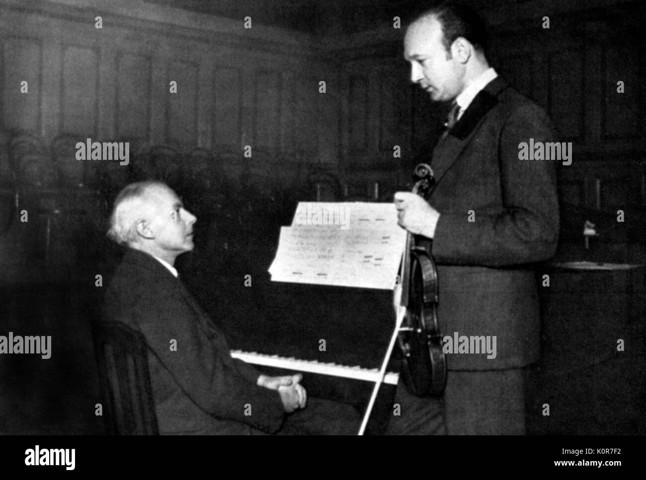 Bartok and Szigeti  c.1929 working on duet Bela Bartok Hungarian pianist and composer 1881-1945. Joseph Szigeti 1892-1973. Hungarian violinist Stock Photo