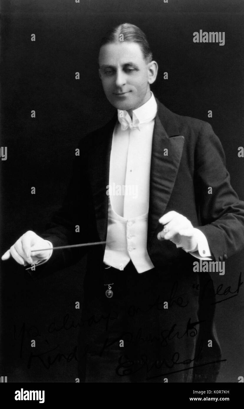 Conductor early 20th century, conducting with baton. Generic Stock