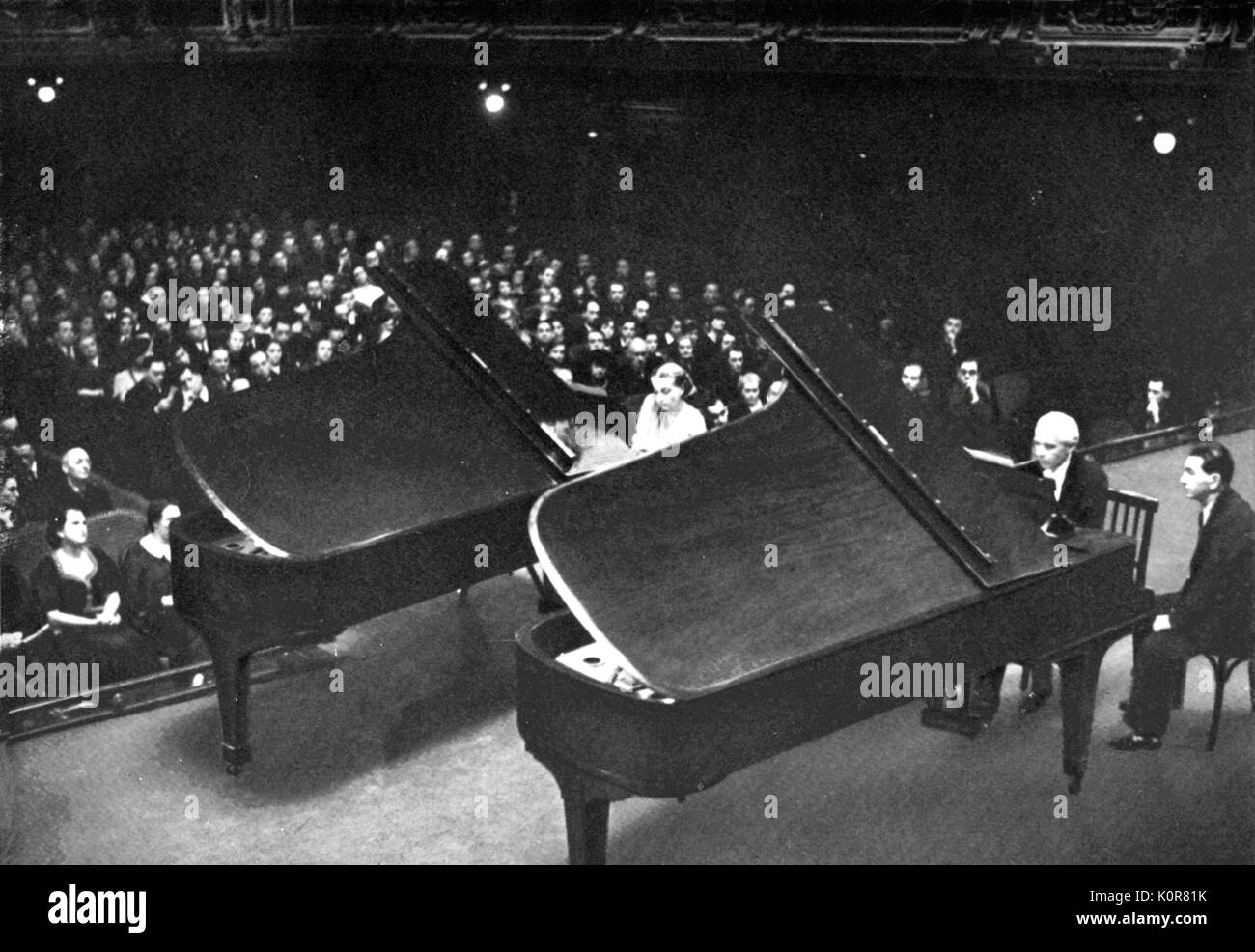 Bela Bartok and his second wife Ditta Pasztory in 1938  playing at two pianos. Hungarian composer and pianist  (1881-1945). Stock Photo