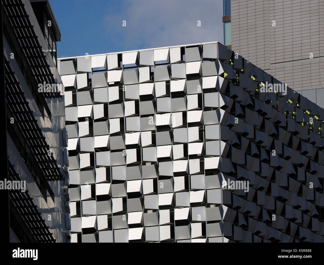 cubist facade to modern city centre building between more traditional office blocks in Sheffield, South Yorkshire, England, UK Stock Photo