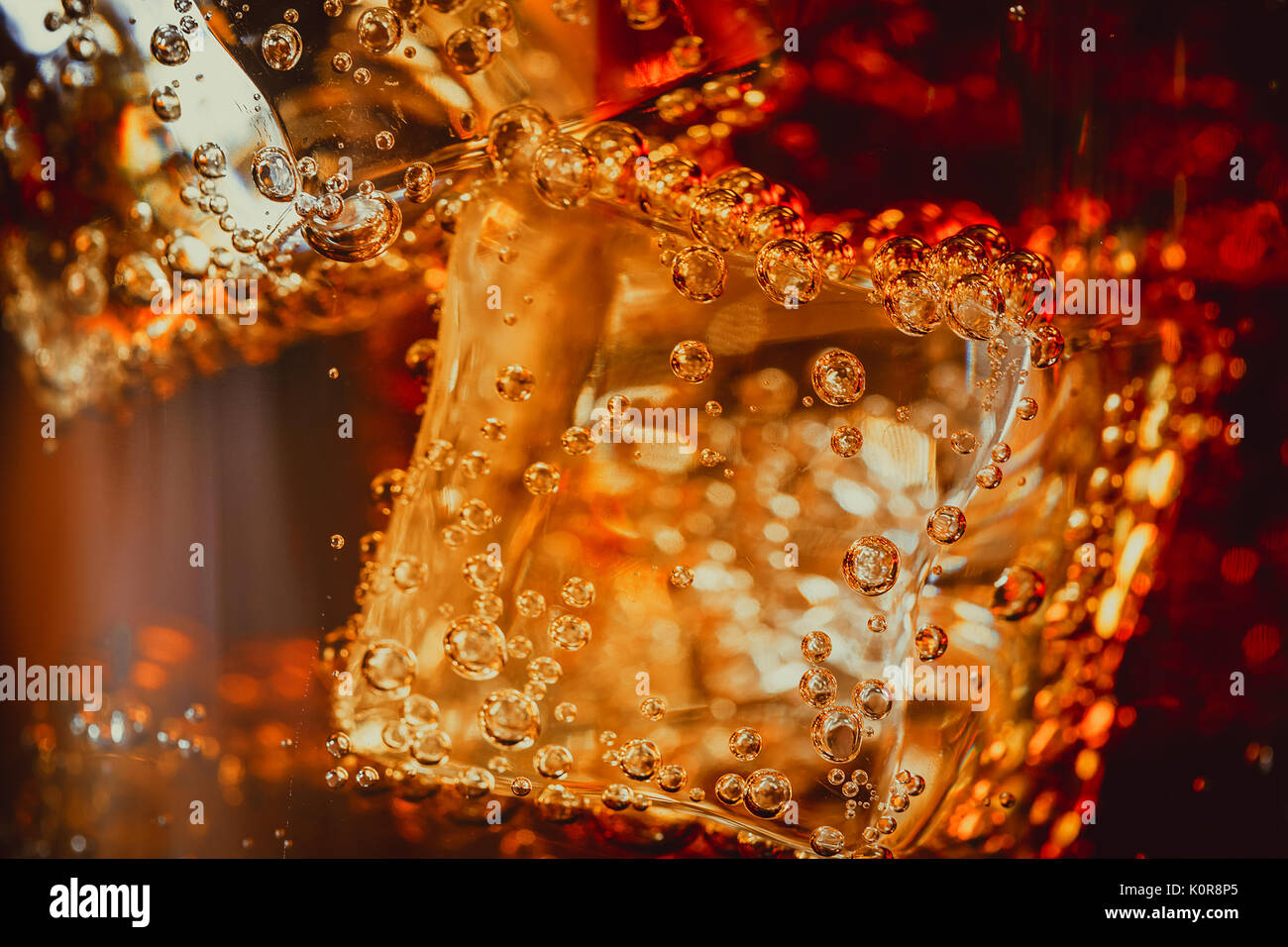 Beautiful cola with ice cubes close up in glass Stock Photo