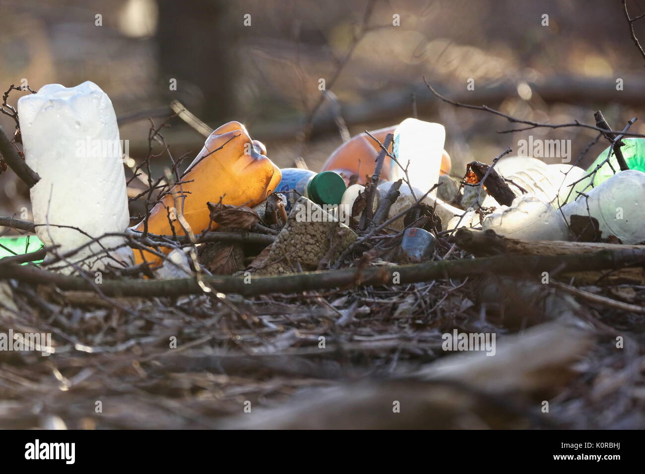 Nature pollution of Polluted nature with plastic waste Stock Photo -