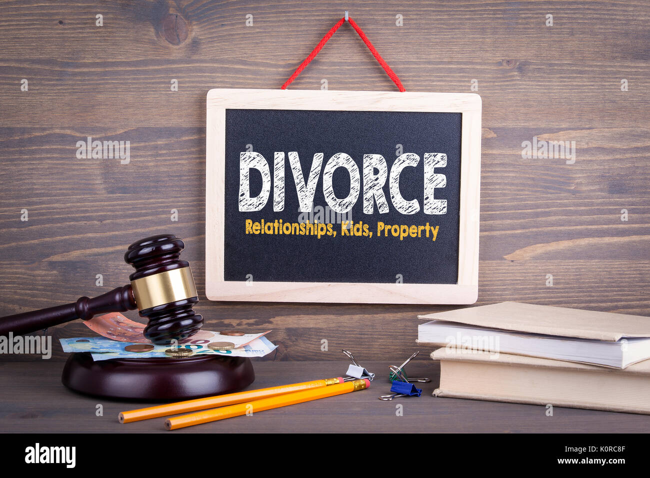Divorce concept. Relationships Children Property. Chalkboard on a wooden background Stock Photo