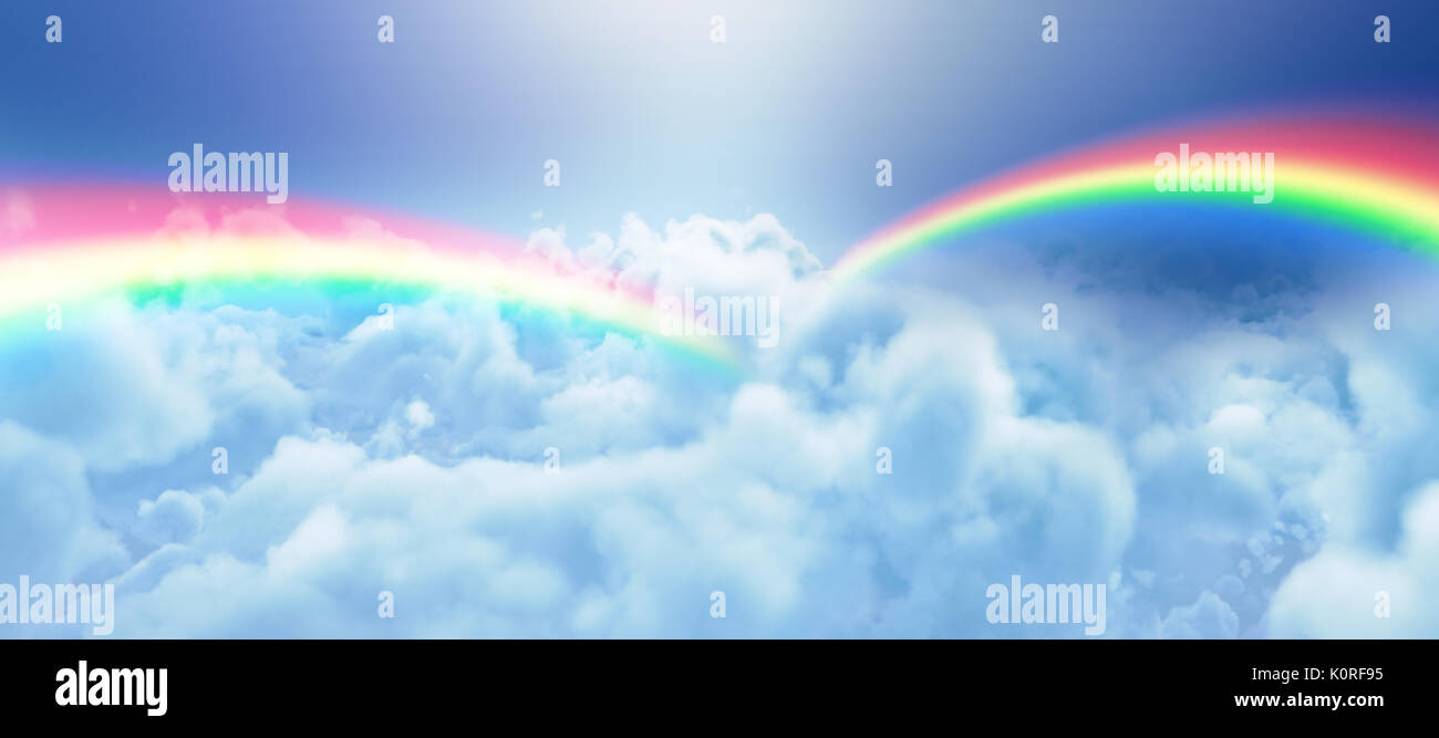Graphic image of double rainbow against clouds against blue sky Stock ...