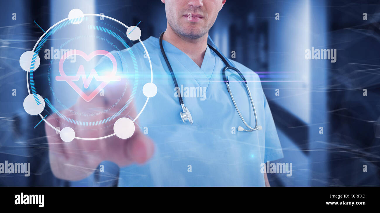 Surgeon pretending to be using futuristic digital screen against vacant corridor Stock Photo