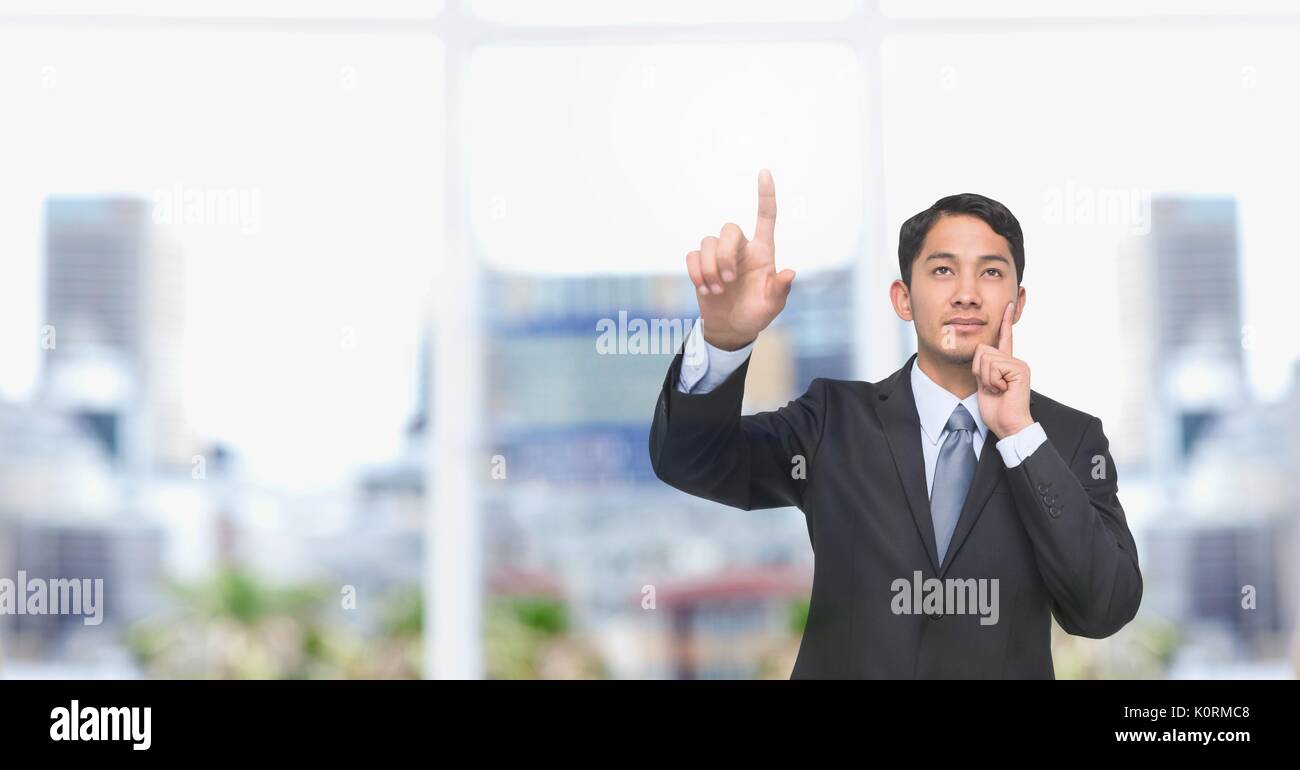 Digital composite of Businessman interacting with the air Stock Photo