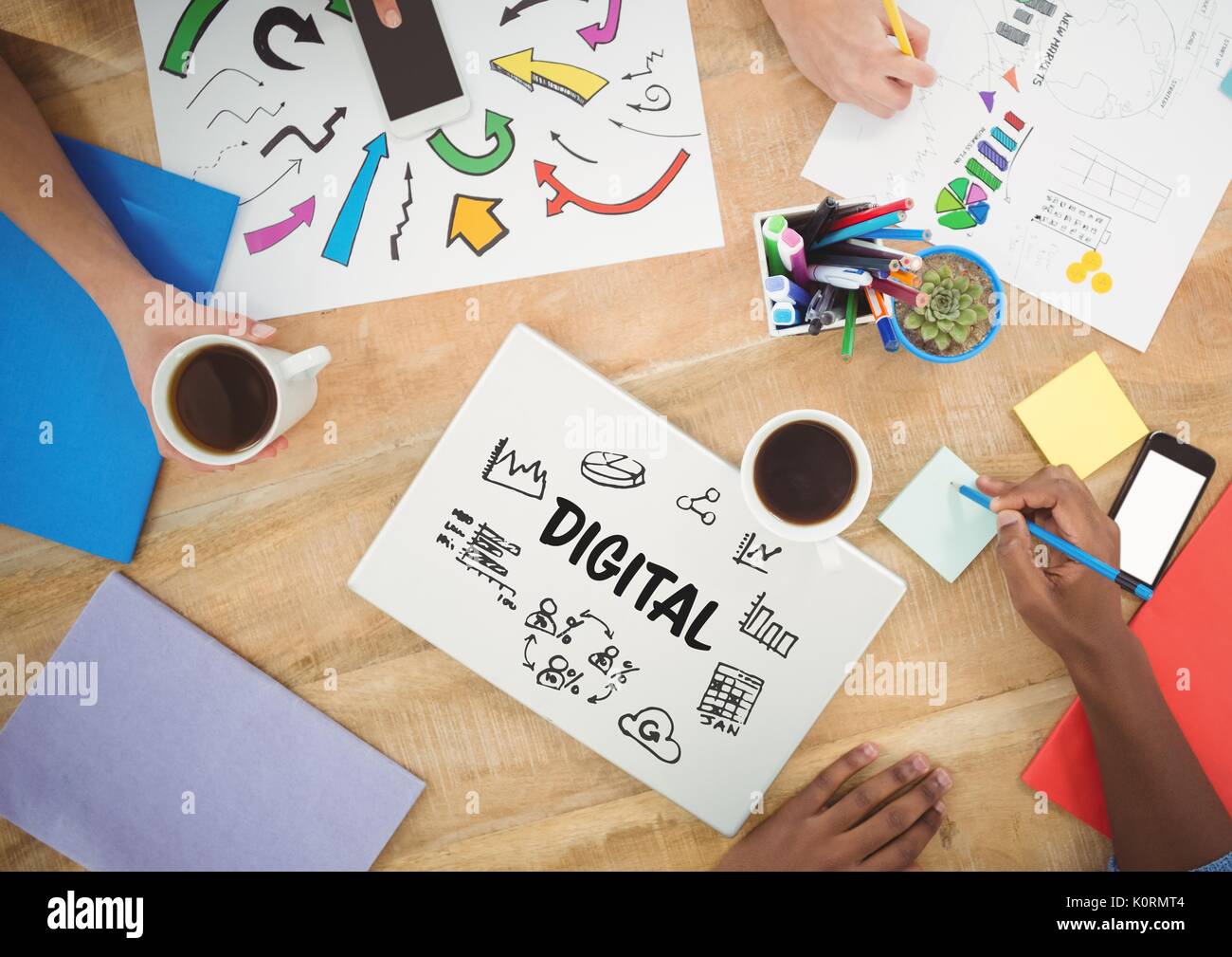 Digital composite of Table top meeting with web graphics Stock Photo