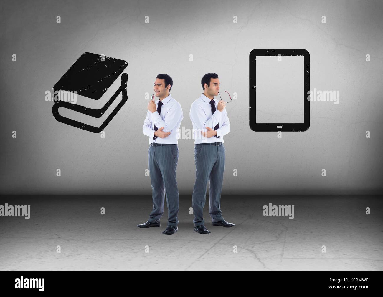 Digital composite of Books or tablet with Businessman looking in opposite directions Stock Photo