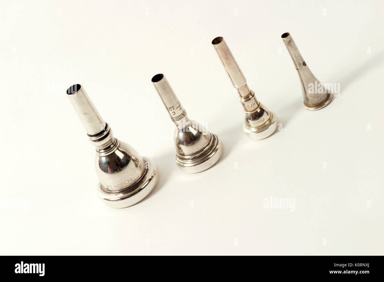 Brass mouthpieces, LR, Tuba, Trombone, Trumpet, Horn Stock Photo Alamy