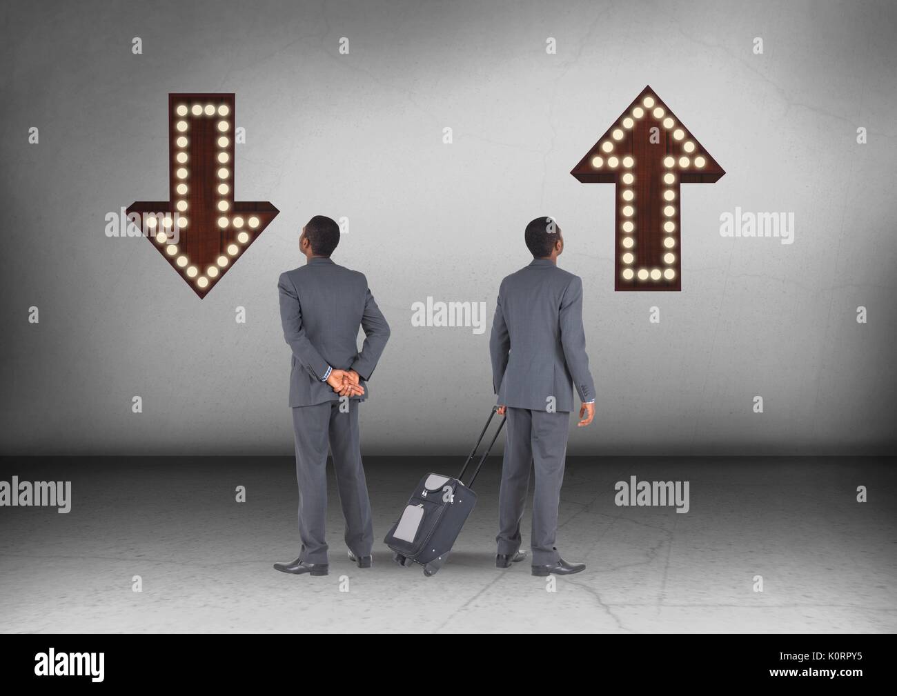 Digital composite of Up or down arrows with Businessman looking in