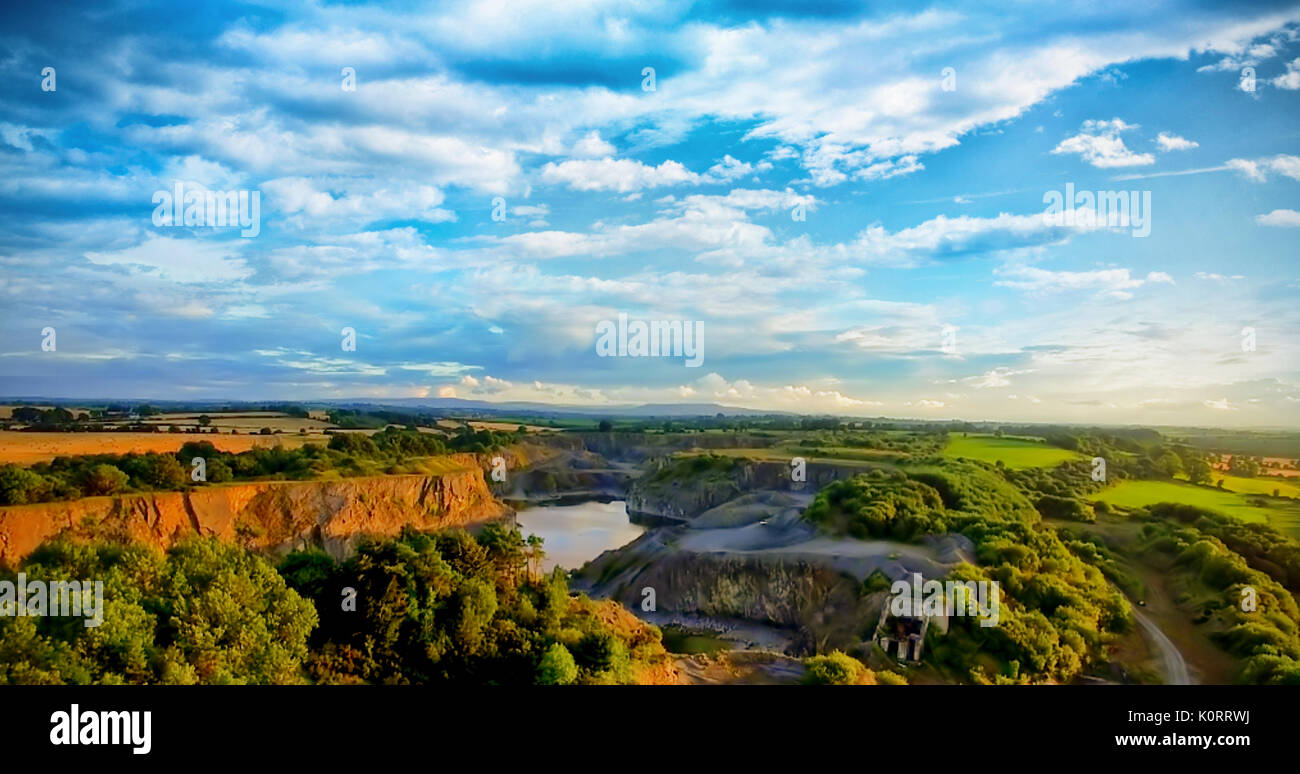 Tranquil scene of landscape against cloudy sky Stock Photo