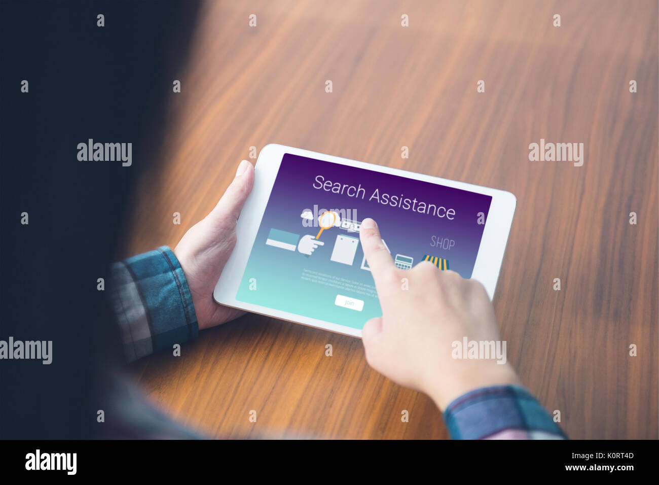 Search assistance text with icons against woman using a digital tablet Stock Photo