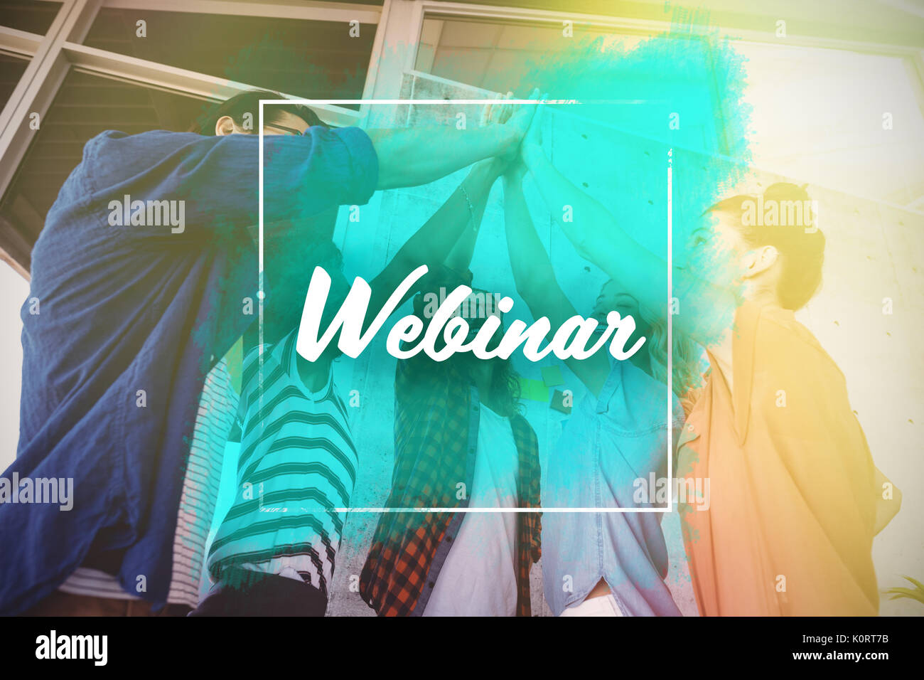 Webinar text against white background  against business people giving high five in creative office Stock Photo
