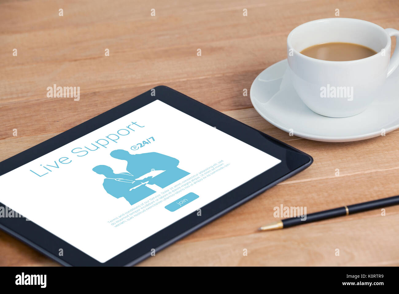 Live support text with human representations against digital tablet with pen and cup of tea Stock Photo