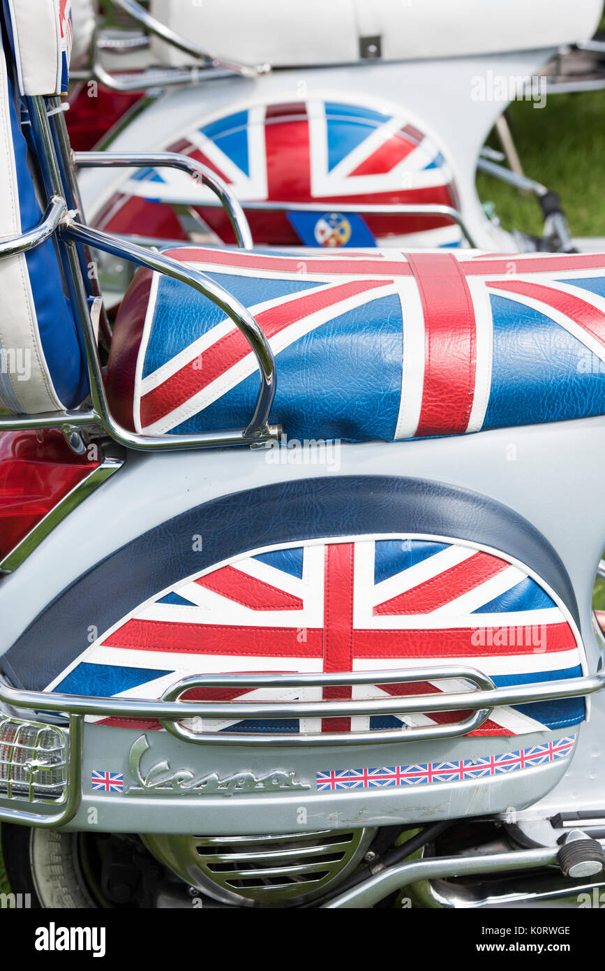 Mods vespa custom scooter covered with union jacks at a vintage retro festival. UK Stock Photo