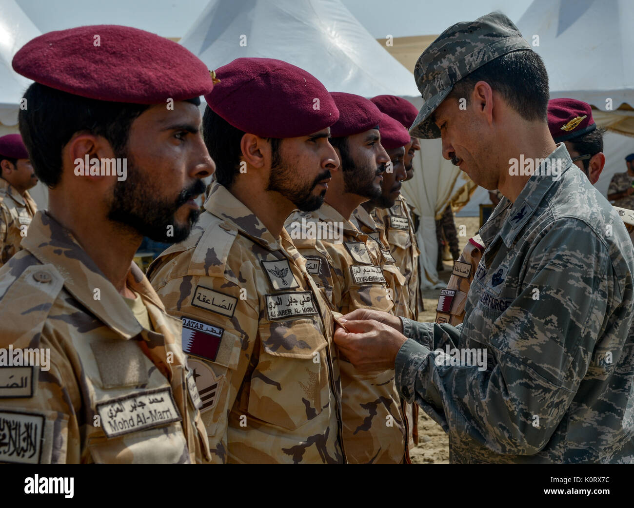 U.S. and Qatari service members conduct joint static-line and free-fall ...