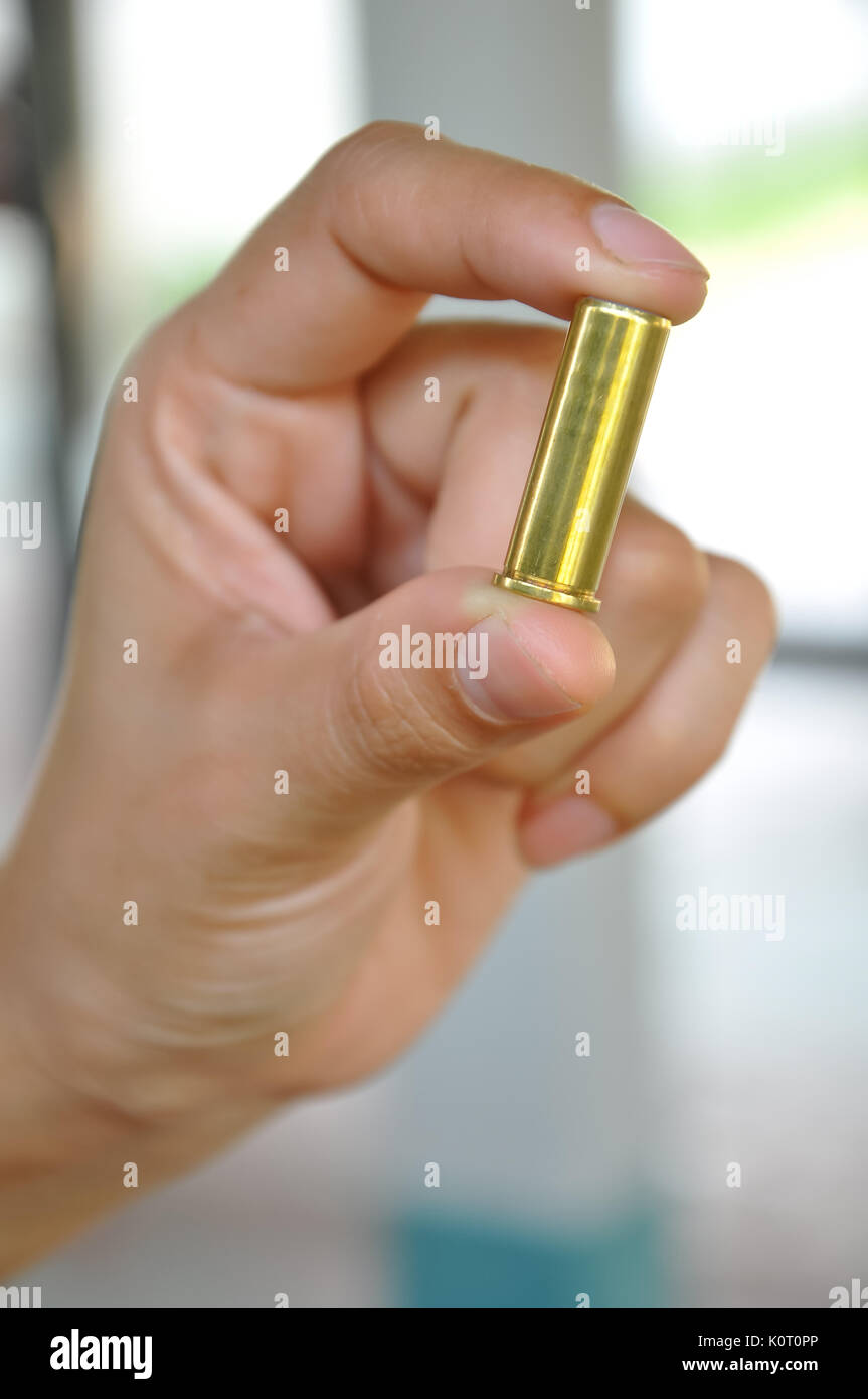 A bullet is a projectile propelled by a firearm, sling, or air gun Stock Photo Alamy