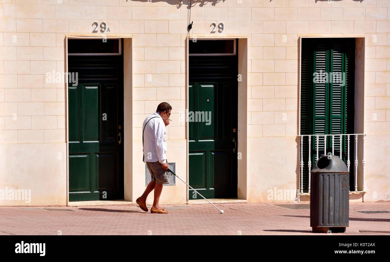 Blind man using walking stick Mahon Menorca Minorca Stock Photo
