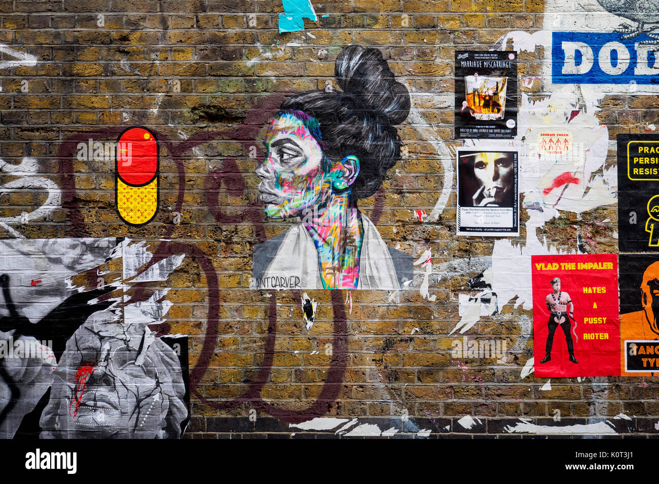 Art graffiti in Brick Lane. Shoreditch, London (UK). Stock Photo