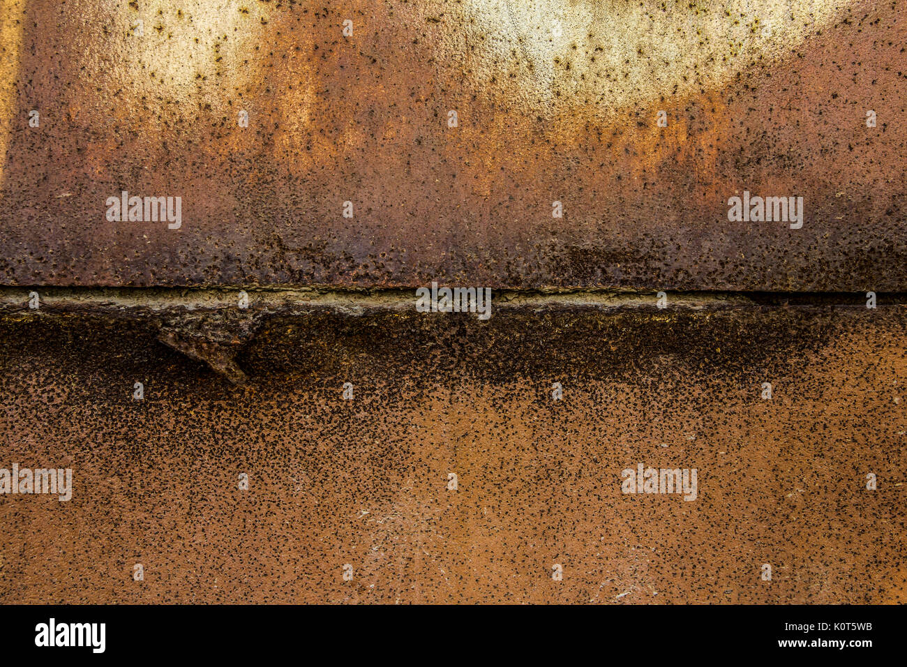 Two parts of Rusted metal plates texture with peeling metal along the ...