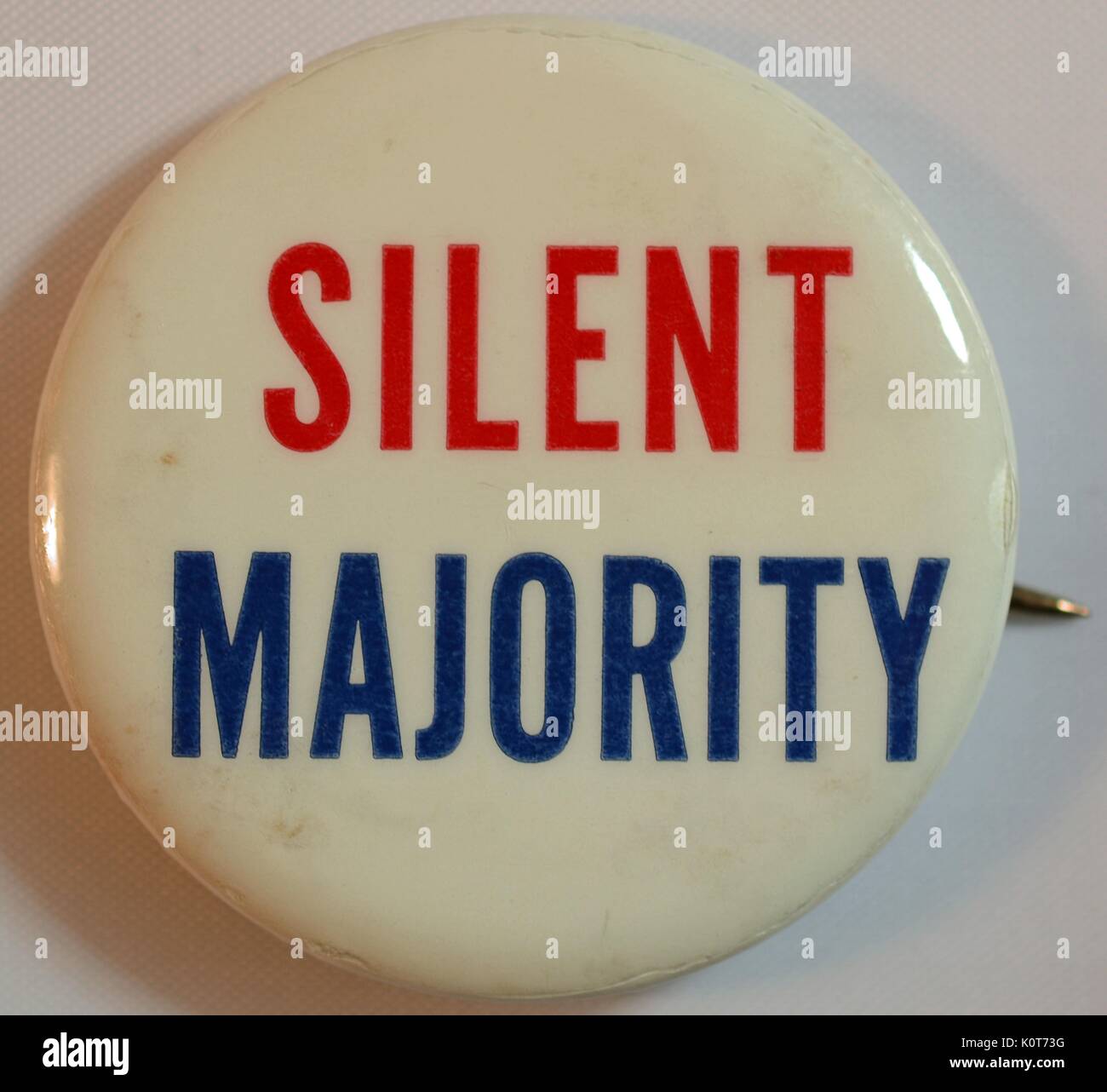 A pin that supports United States military action in Vietnam, it contains the text 'Silent Majority' which references a term used by President Nixon to indicate that he believed most United States citizens supported his policies and the US military in Vietnam, 1968. Stock Photo
