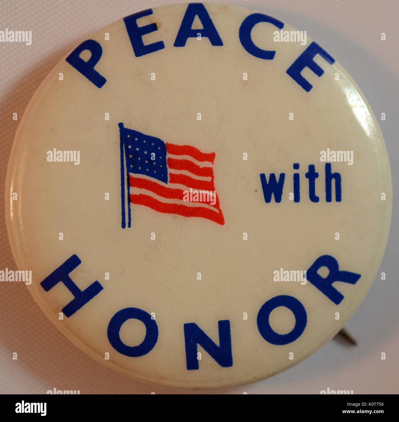 A Vietnam War pin that contains the phrase 'Peace with honor' which President Nixon used to describe the Paris Peace Accord which would end the Vietnam War, 1968. Stock Photo