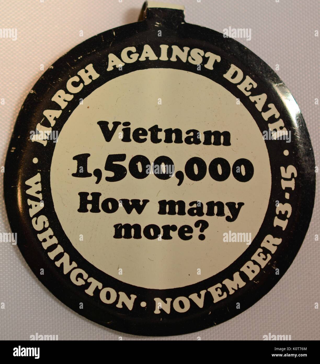 A pin advertising the march on Washington D.C. that took place from November 13th to the 15th 1969, the march took place at the end of teh Moratorium to End the War in Vietnam, the pin claims the death toll of the war up until that point was 1.5 million people, 1969. Stock Photo