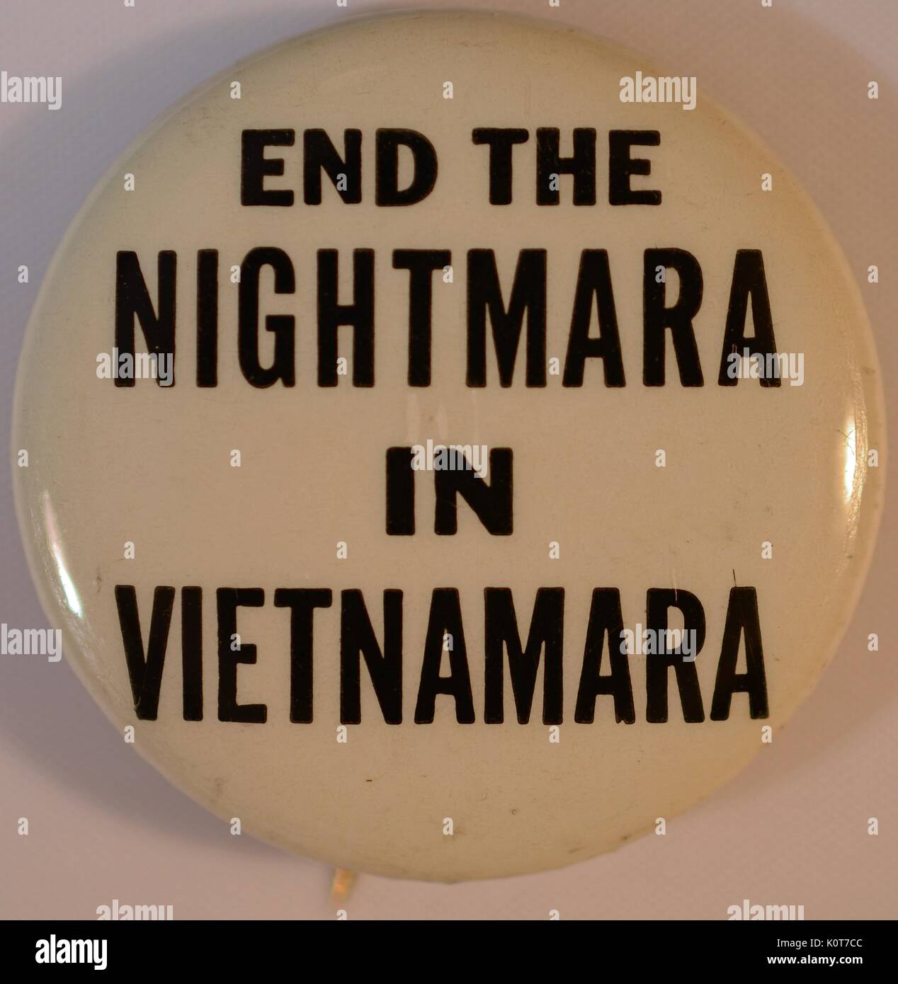 An anti-Vietnam War protest pin that reads 'End the Nightmara in Vietnamara', the wording used references then Secretary of State Robert Macnamara due to his role in escalating the United States military action in Vietnam, 1968. Stock Photo