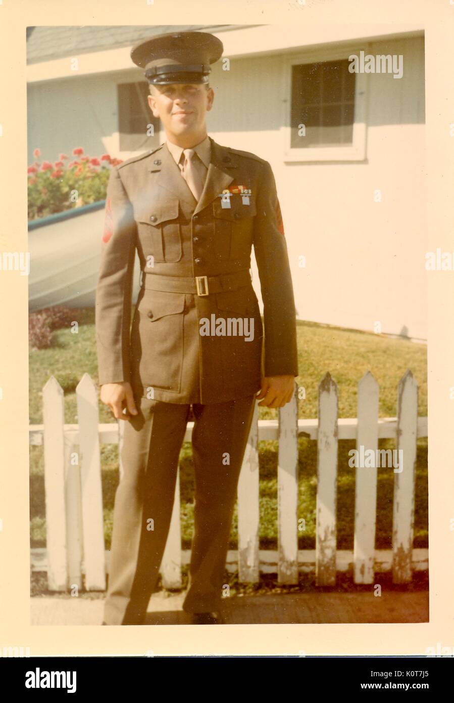 A photograph of United States Marine Charles M. Bollinger in his dress uniform that features his military ribbons and badges, he was a radio operator in the 2nd Battalion 4th Marines, 1968. Stock Photo