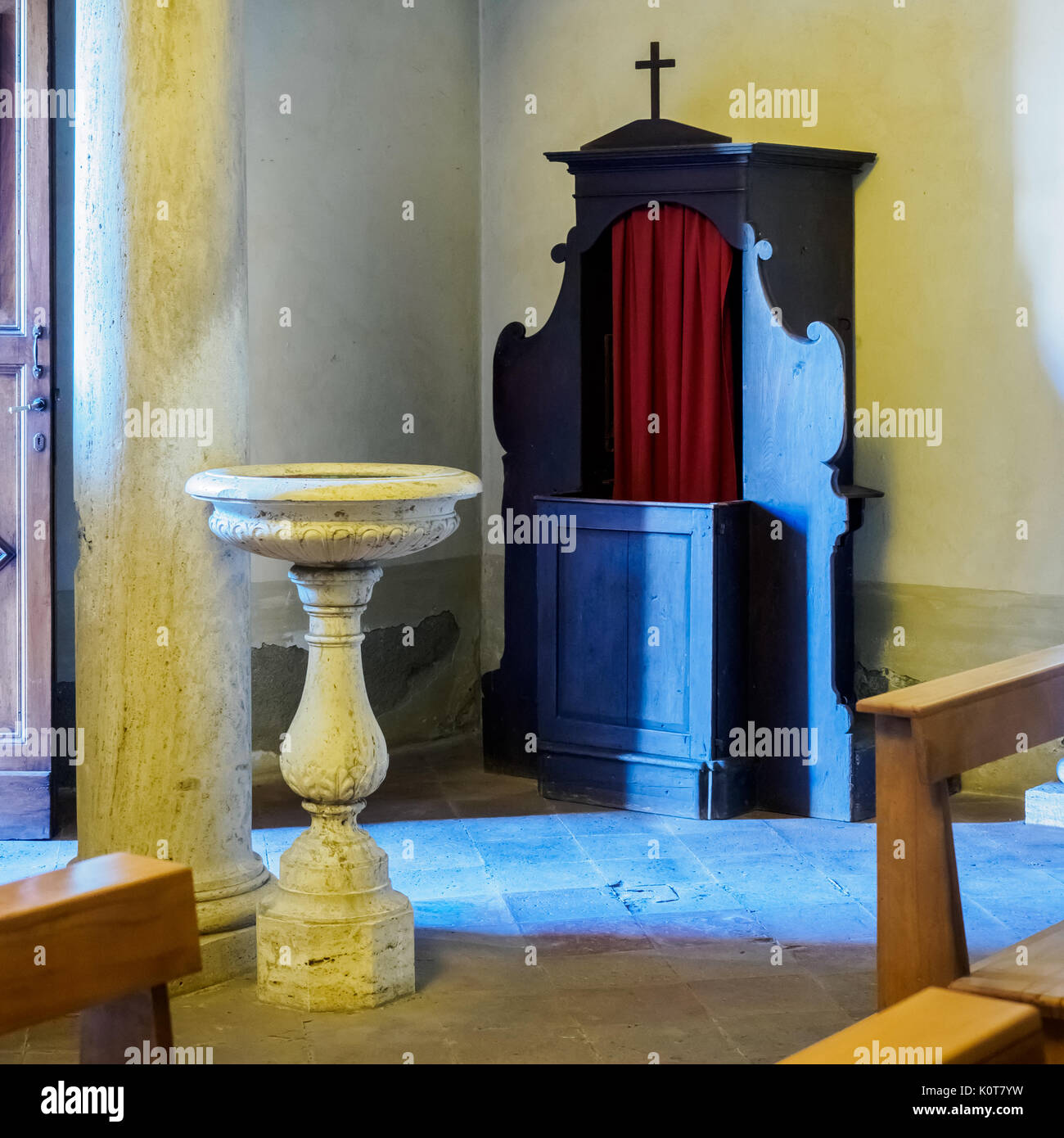 Confessional booth in the church of San Francesco in San Quirico d'Orcia (Italy). March 2017. Square format. Stock Photo