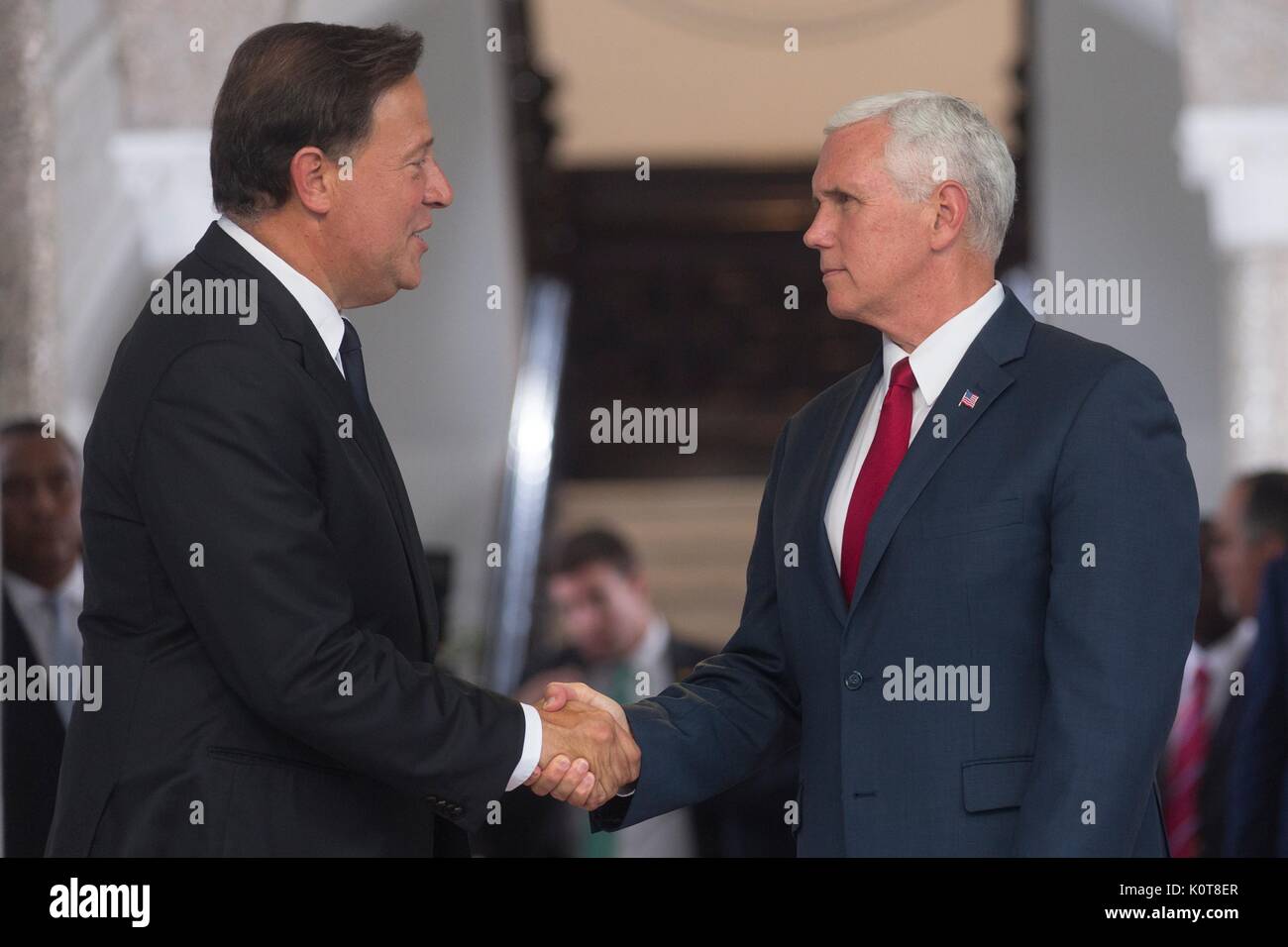 U.S. Vice President Mike Pence shakes hands with Panamian President Juan Carlos Varela, left, as he departs the presidential palace August 17, 2017 in Panama City, Panama. Pence has been on a week-long tour of Latin America. Stock Photo
