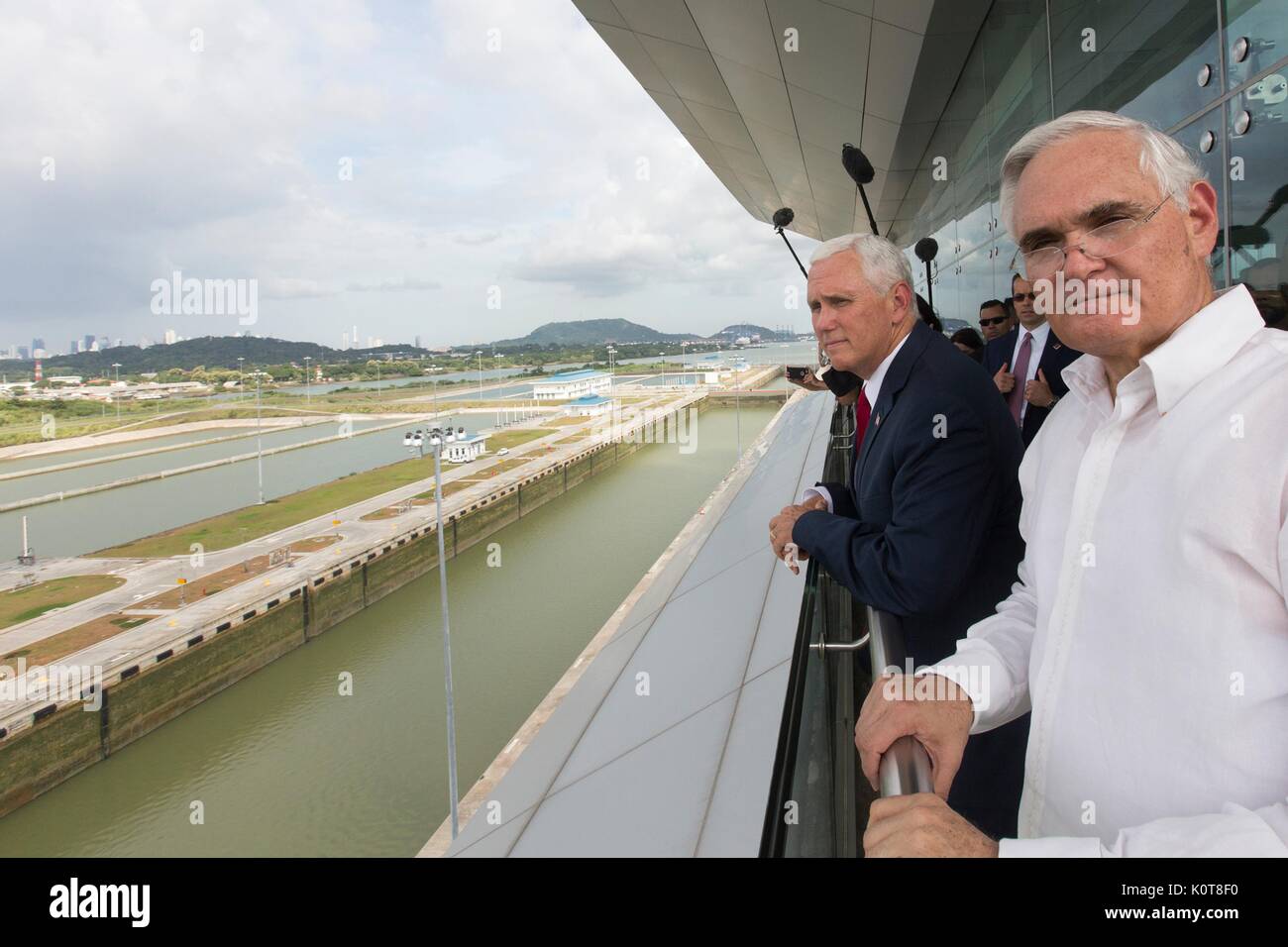 U.S. Vice President Mike Pence views the Cocoli Locks of the Panama Canal with Administrator Jorge Quijano, right, August 17, 2017 in Panama City, Panama. Pence has been on a week-long tour of Latin America. Stock Photo