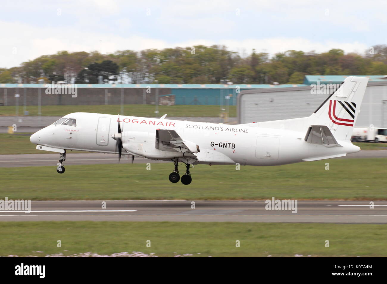 G-GNTB, a Saab 340 operated by Loganair, during training at Glasgow Prestwick International Airport in Ayrshire. Stock Photo