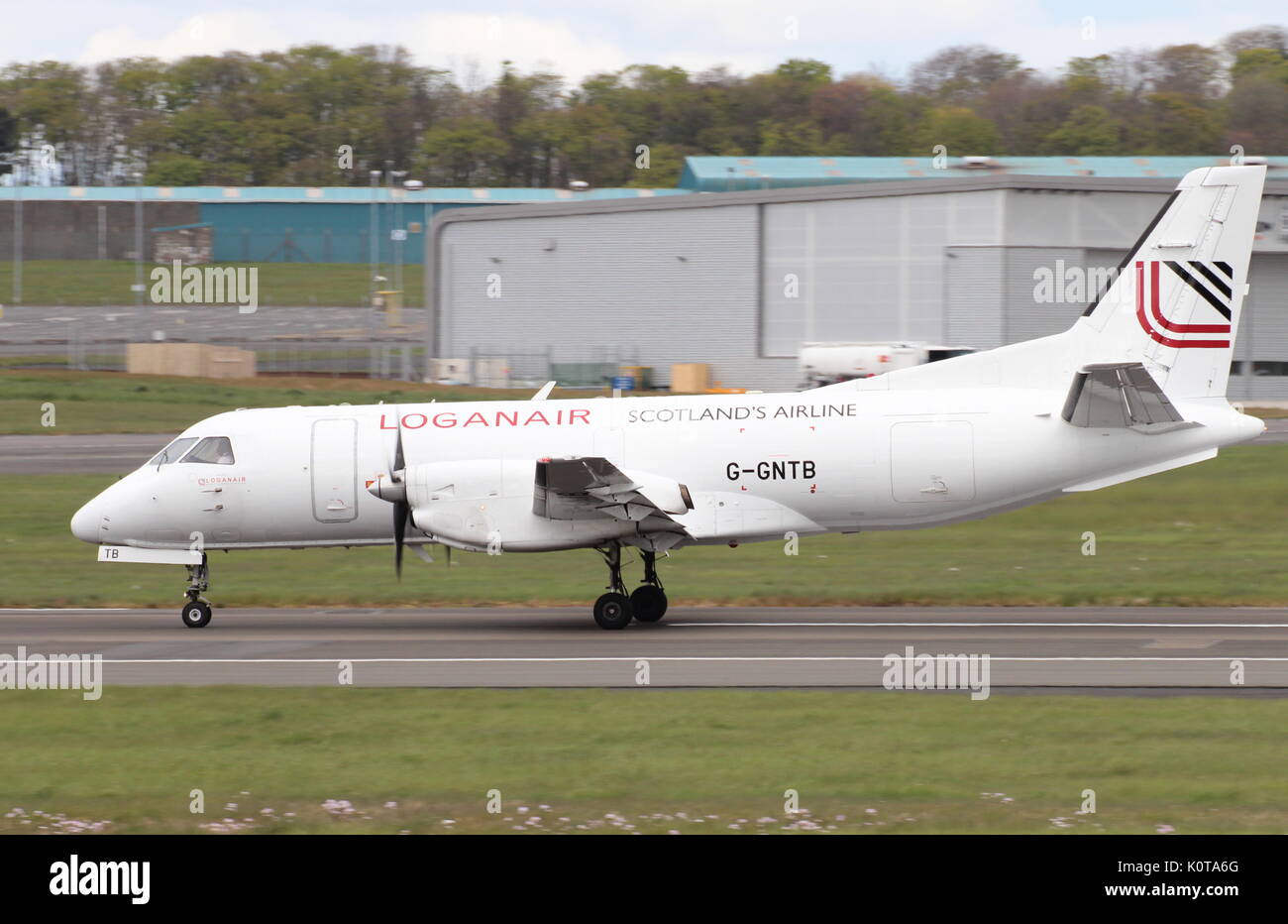 G-GNTB, a Saab 340 operated by Loganair, during training at Glasgow Prestwick International Airport in Ayrshire. Stock Photo