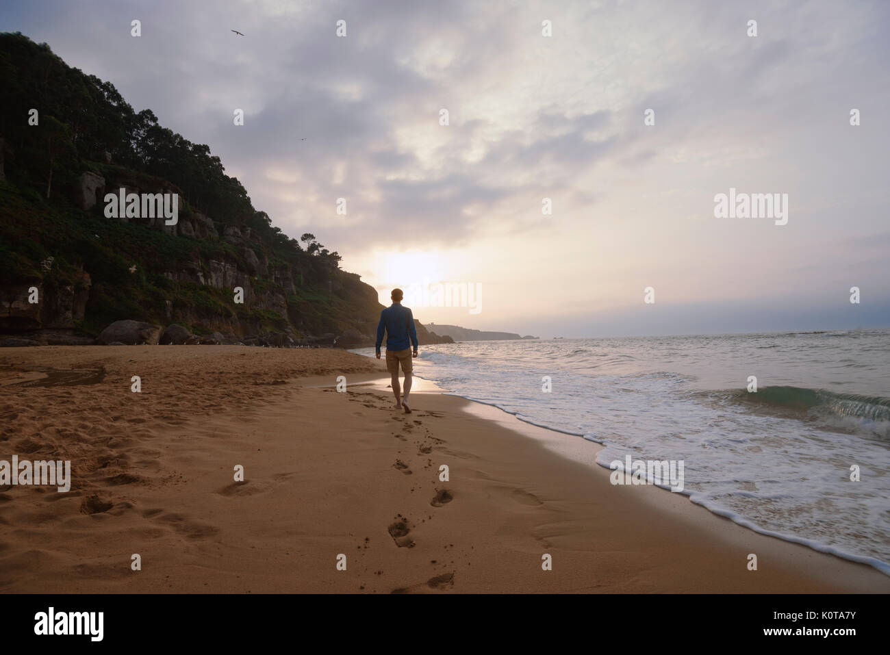 Fit young man walking alone hi-res stock photography and images - Alamy