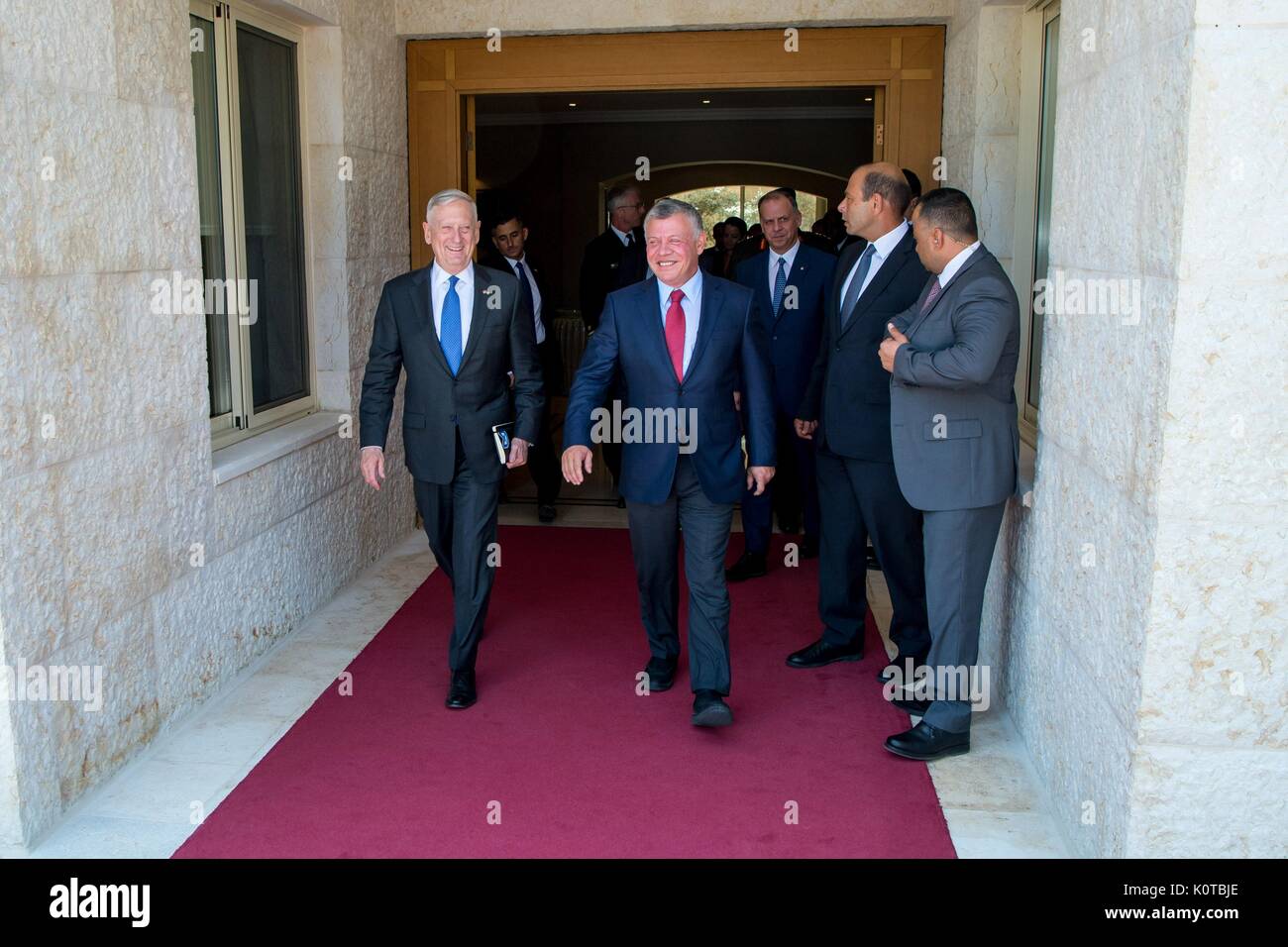 U.S. Secretary of Defense James Mattis walks with King Abdullah II of Jordan at the Beit Al Urdon palace August 21, 2017 in Amman, Jordan. Stock Photo