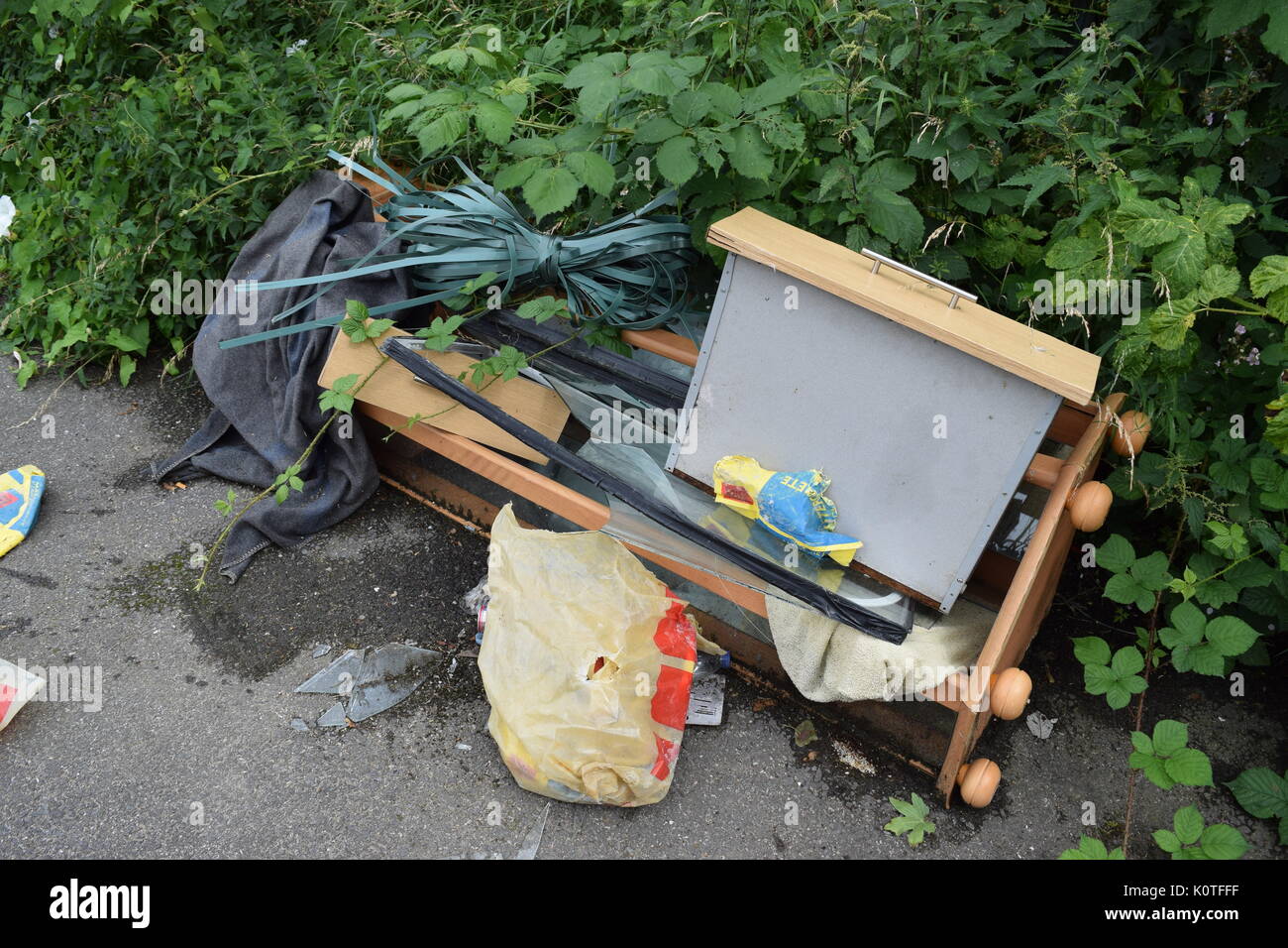 Broken furniture left on the street Stock Photo Alamy