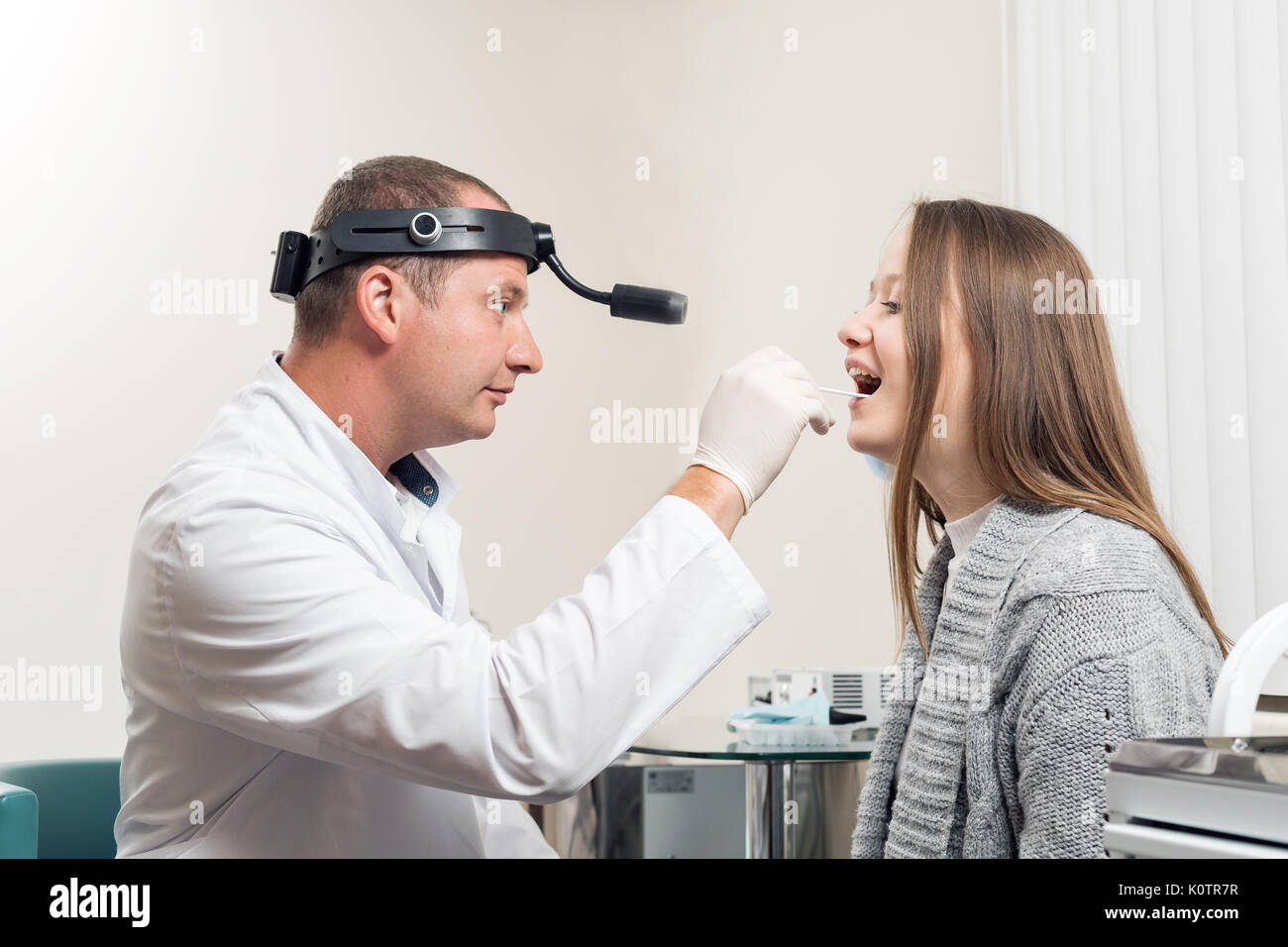 Nose and throat examination otoscope pediatrics pediatrician health