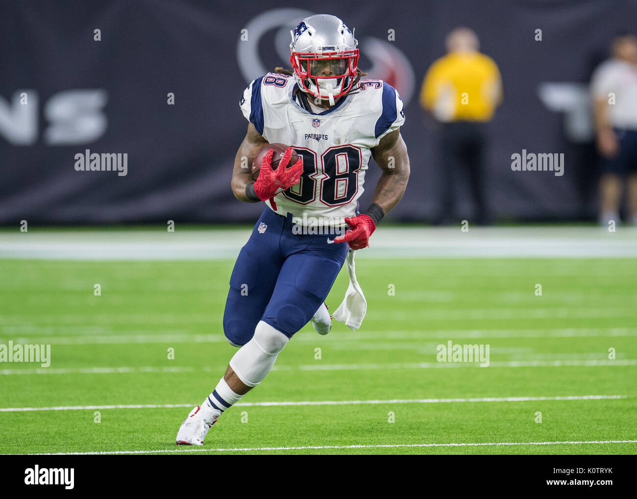 New England Patriots quarterback Tom Brady (12) points his finger to the  sky after the Patriots scored on a one-yard carry by running back Brandon  Bolden (not pictured) in the third quarter