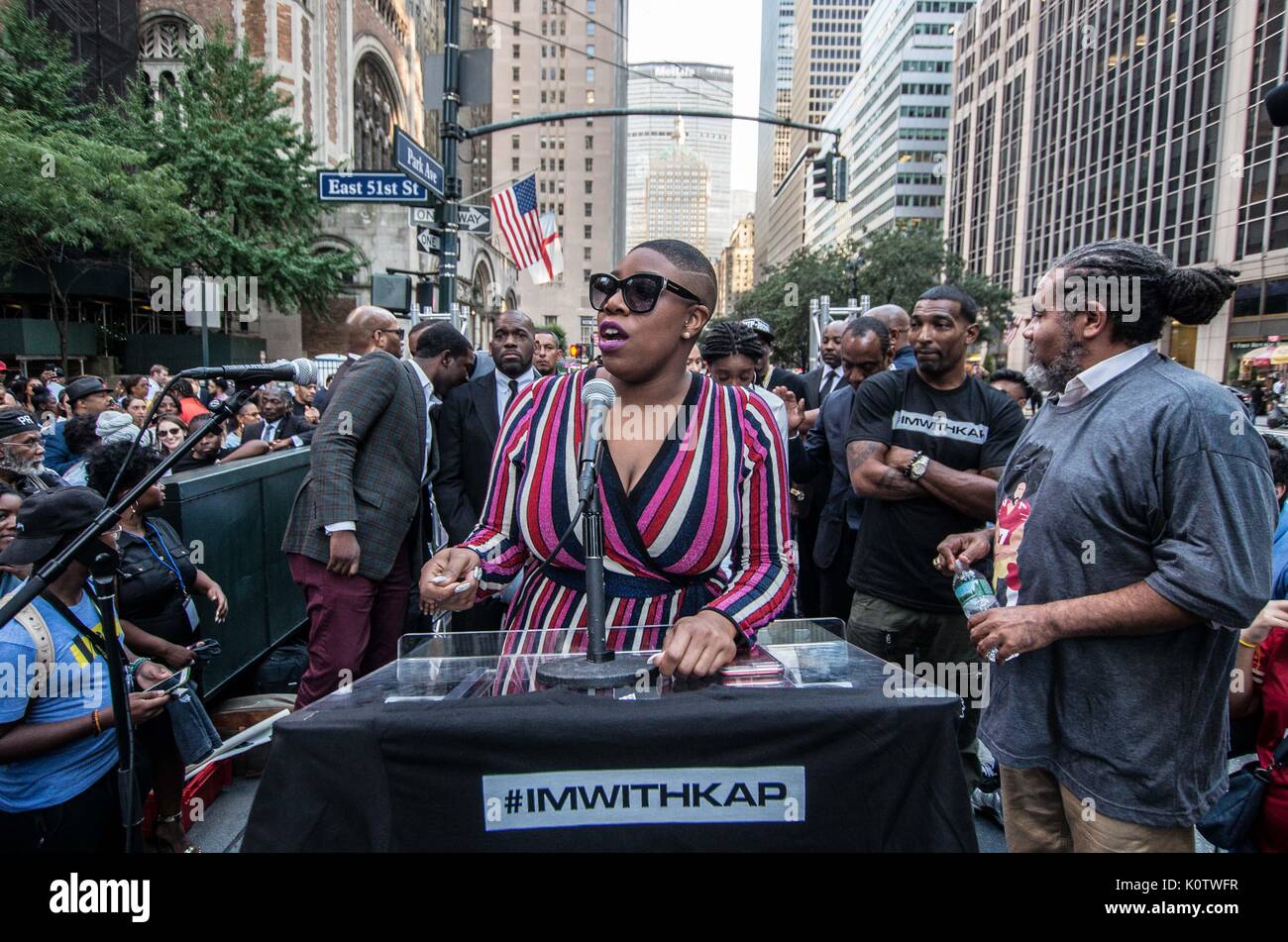 New York City, New York, USA. 23rd Aug, 2017. Simone Sanders. New Yorkers rallied behind now-unsigned NFL player Colin Kaepernick who has remained seated during the singing of the US Nation. al Anthem since 2016. Kaepernick has stated ''I am not going to stand up to show pride in a flag for a country that oppresses black people and people of color.' Credit: ZUMA Press, Inc./Alamy Live News Stock Photo