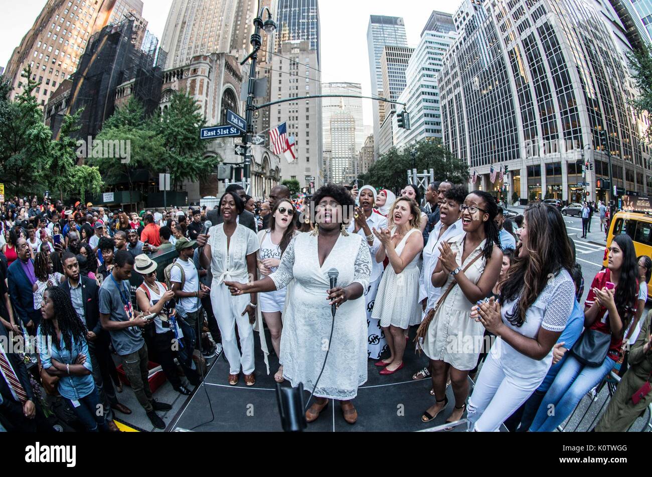 New York City, New York, USA. 23rd Aug, 2017. Women's March Choir. New Yorkers rallied behind now-unsigned NFL player Colin Kaepernick who has remained seated during the singing of the US Nation. al Anthem since 2016. Kaepernick has stated ''I am not going to stand up to show pride in a flag for a country that oppresses black people and people of color.' Credit: ZUMA Press, Inc./Alamy Live News Stock Photo