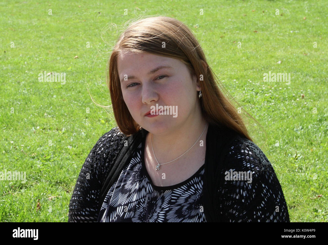 Abduction victim Natascha Kampusch can be seen in a park in Vienna, Austria, 21 August 2017. Her case moved the entire world. The Viennese was kidnapped as a ten-year-old on her way to school and was held and abused in a cellar for eight years. Eleven years after her liberation, she turns her creative passion into a profession. Photo: Sandra Walder/dpa Stock Photo