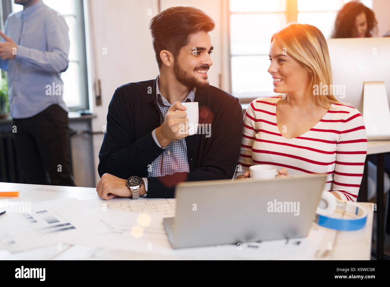 Two young perspective architects working on laptop Stock Photo