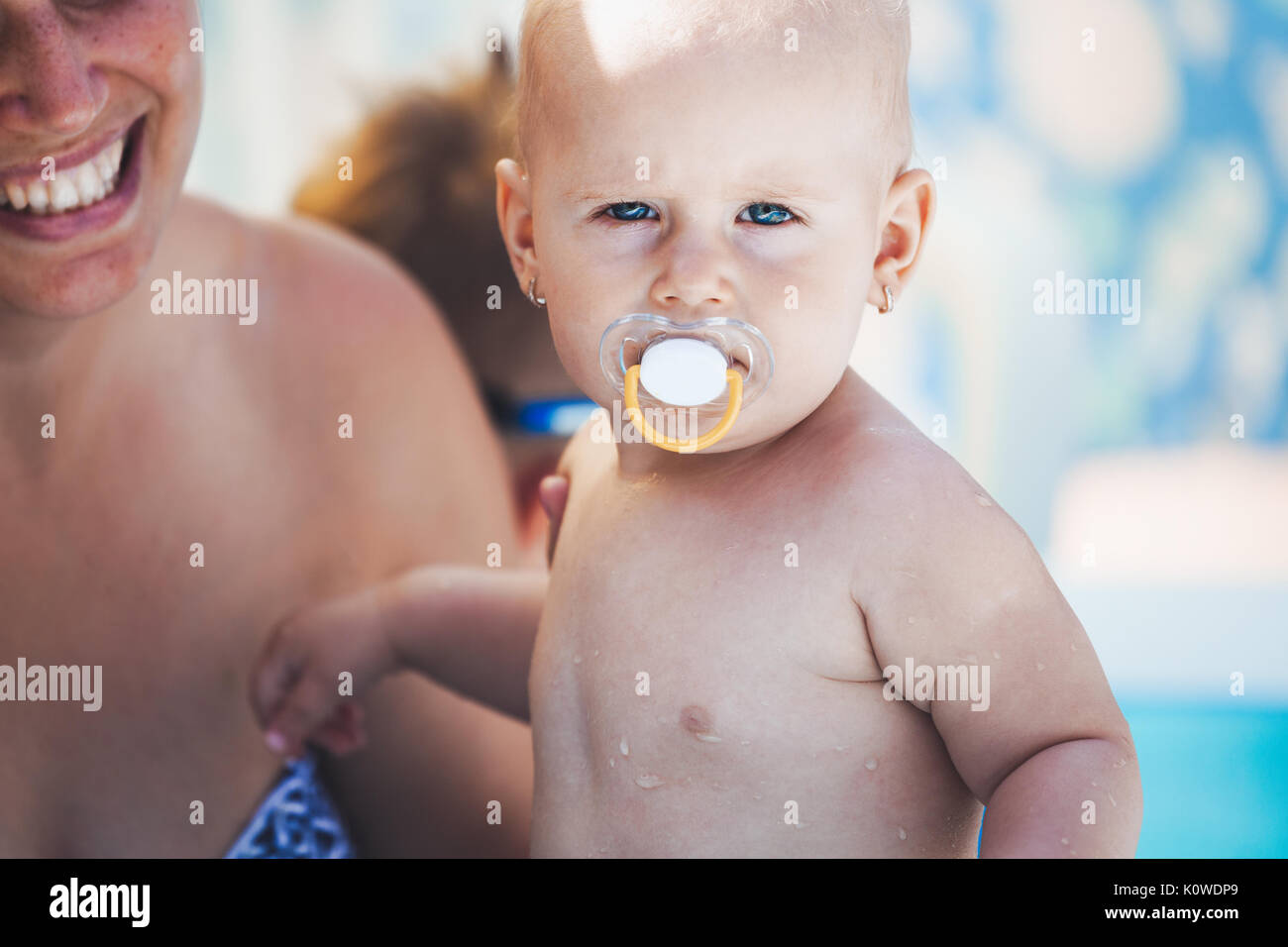 Picture of cute baby with her mother Stock Photo