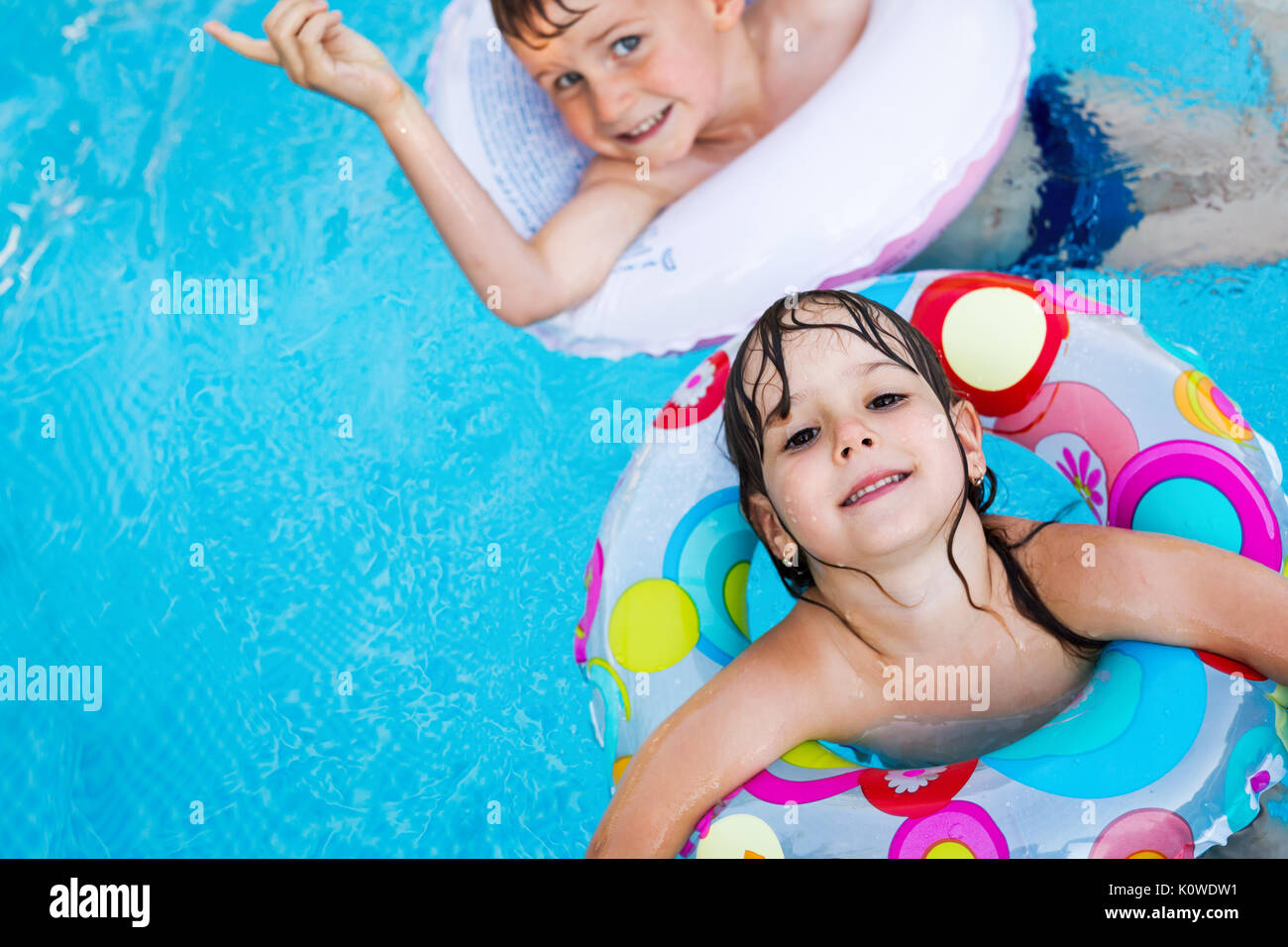 Picture Of Little Kids Enjoying In Swimming Pool Stock Photo Alamy