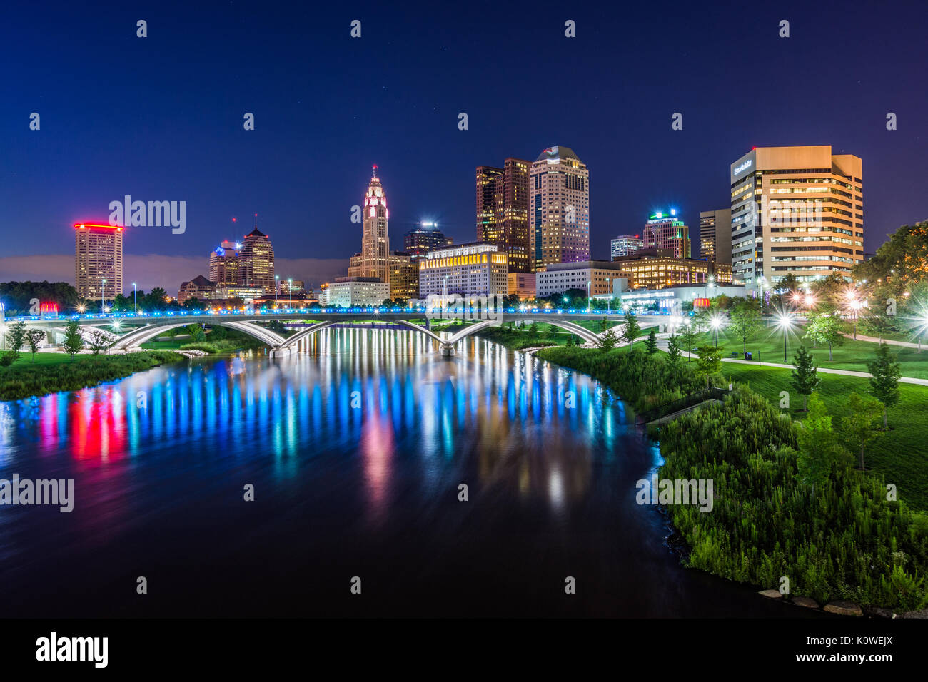 Skyline of Columbus, Ohio from Bicentennial Park bridge at Night Stock Photo
