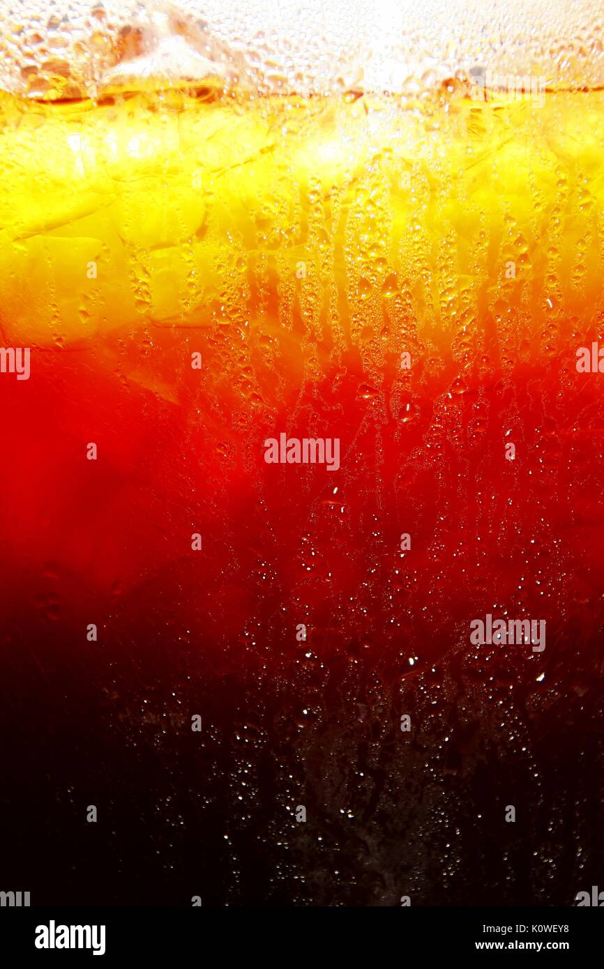 Photo of mixed cold iced tea in a glass container Stock Photo - Alamy