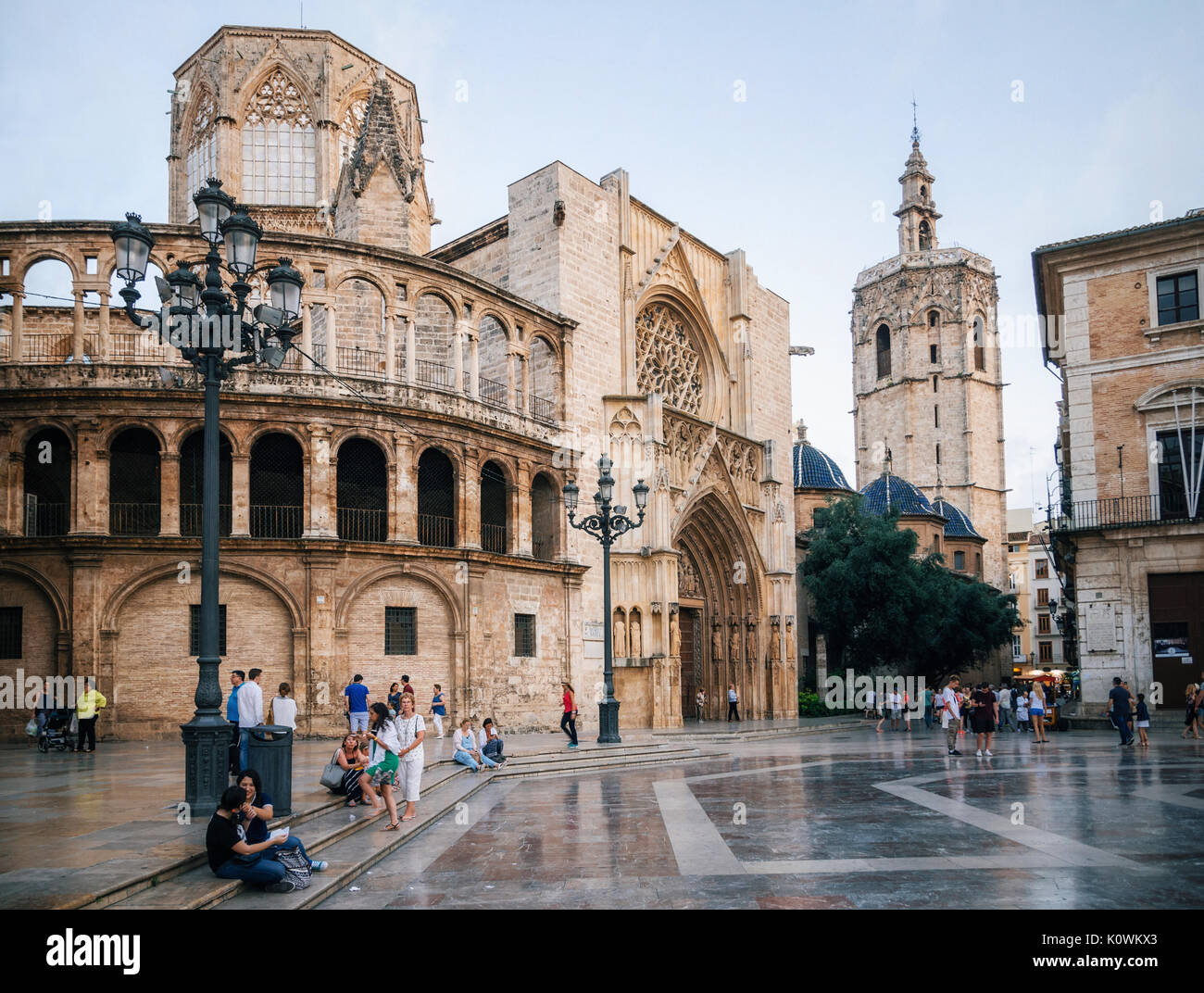 Valencia, Spain - June 2, 2016: Square of Saint Mary with local and tourists in Valencia Old Town in the evening, Spain Stock Photo