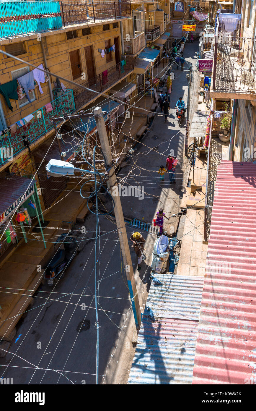 JAISALMER, RAJASTHAN, INDIA - MARCH 06, 2016: From the rooftop of Saalam Singh Ki Haweli, normal street in Jaisalmer, known as Golden City in India. Stock Photo