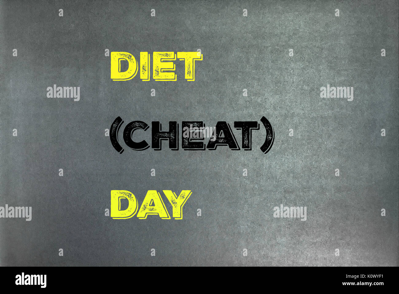 The phrase Diet Day placed onto a chalkboard texture background.  Graphic Design. Stock Photo
